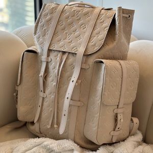 Louis Vuitton back pack as is.